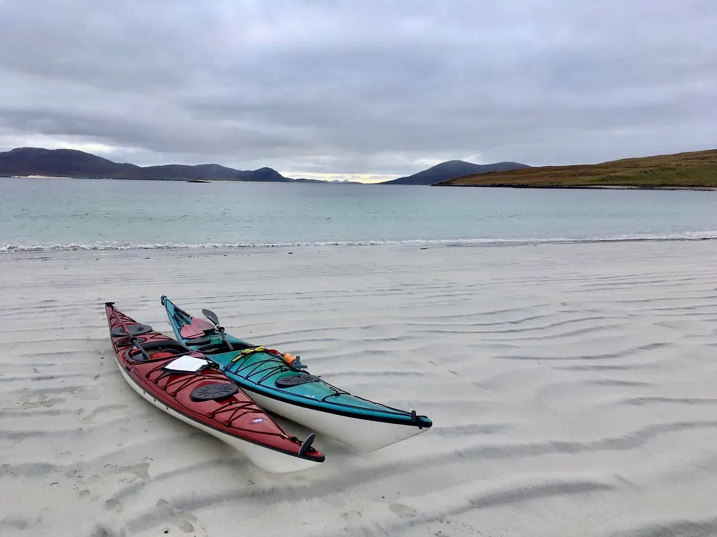 Sue and Jon’s kayaks artfully beached on Taransay (photo: Jon Whitaker)