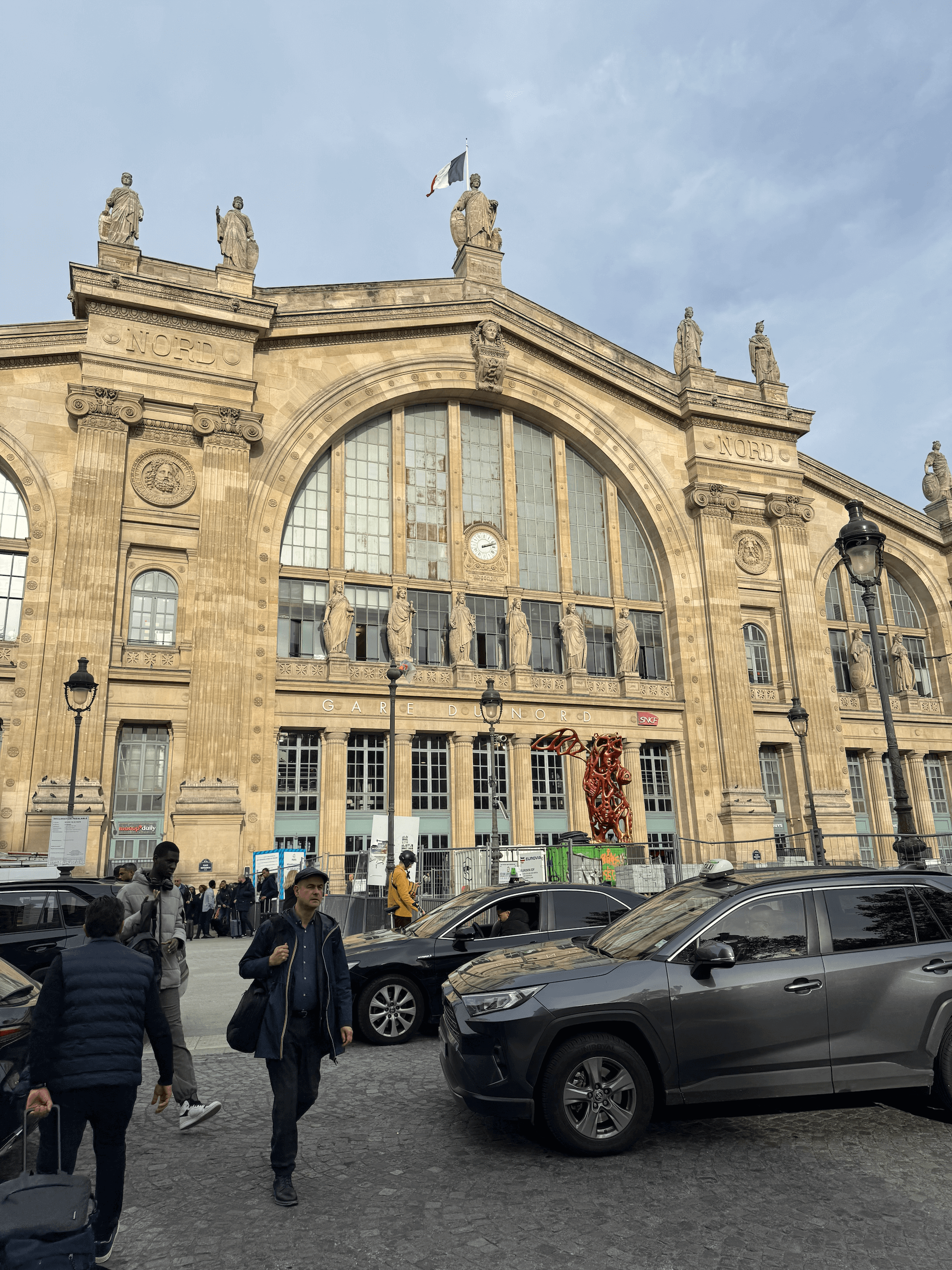 a train station and busy street